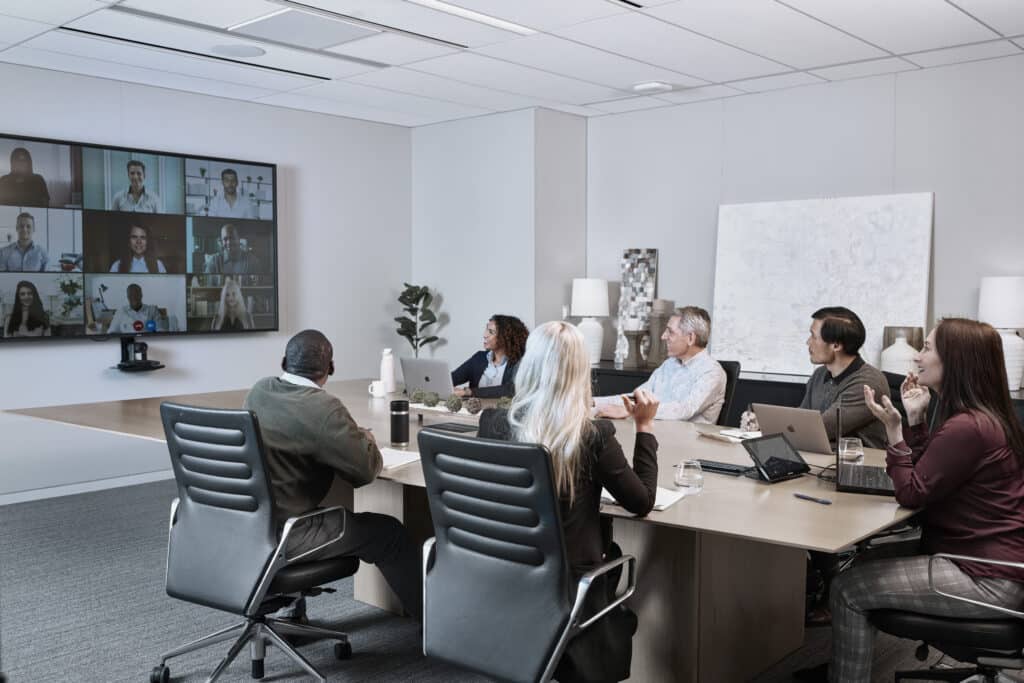 Shure MXA920 Ceiling Array Mic being used with large hybrid meeting in conference room