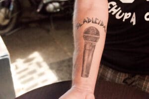 tattoo of SM58 on Sladicidal lead singer Frank's forearm